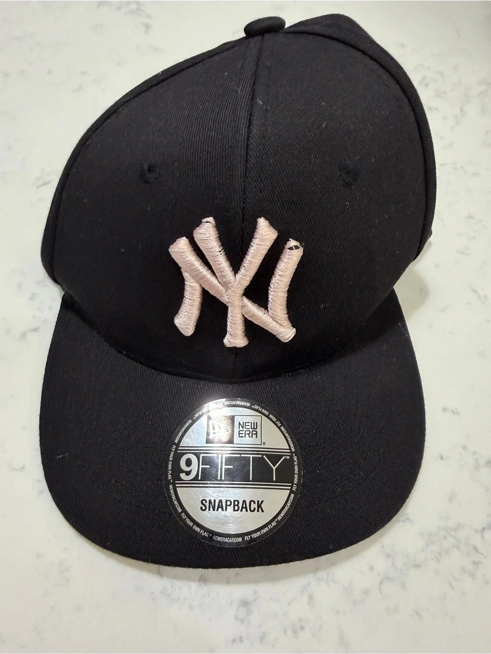 New Era Kids Black Snapback Cap with Light Pink NY Logo